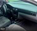 Серый Шевроле Лачетти, объемом двигателя 1.6 л и пробегом 299 тыс. км за 3950 $, фото 1 на Automoto.ua
