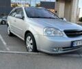 Серый Шевроле Лачетти, объемом двигателя 1.8 л и пробегом 232 тыс. км за 3950 $, фото 1 на Automoto.ua