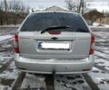 Сірий Шевроле Лачетті, об'ємом двигуна 1.8 л та пробігом 215 тис. км за 4199 $, фото 4 на Automoto.ua