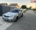 Серый Шевроле Лачетти, объемом двигателя 1.8 л и пробегом 230 тыс. км за 2950 $, фото 1 на Automoto.ua