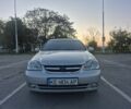Серый Шевроле Лачетти, объемом двигателя 1.8 л и пробегом 239 тыс. км за 4600 $, фото 1 на Automoto.ua