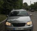 Серый Шевроле Лачетти, объемом двигателя 1.8 л и пробегом 300 тыс. км за 1799 $, фото 1 на Automoto.ua