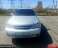 Серый Шевроле Лачетти, объемом двигателя 1.8 л и пробегом 315 тыс. км за 3750 $, фото 1 на Automoto.ua