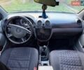 Серый Шевроле Лачетти, объемом двигателя 1.8 л и пробегом 321 тыс. км за 4000 $, фото 9 на Automoto.ua