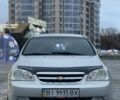 Сірий Шевроле Лачетті, об'ємом двигуна 1.8 л та пробігом 300 тис. км за 3499 $, фото 1 на Automoto.ua