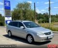 Серый Шевроле Лачетти, объемом двигателя 1.6 л и пробегом 250 тыс. км за 3950 $, фото 1 на Automoto.ua