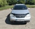 Серый Шевроле Лачетти, объемом двигателя 1.8 л и пробегом 300 тыс. км за 2850 $, фото 1 на Automoto.ua