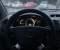 Сірий Шевроле Лачетті, об'ємом двигуна 1.8 л та пробігом 300 тис. км за 3499 $, фото 13 на Automoto.ua
