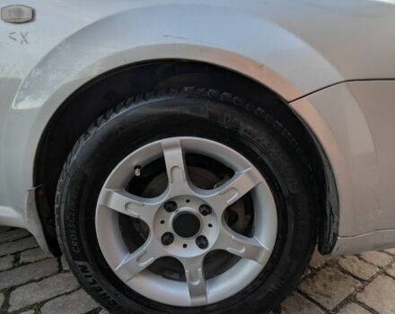 Серый Шевроле Лачетти, объемом двигателя 1.8 л и пробегом 357 тыс. км за 3500 $, фото 13 на Automoto.ua