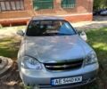 Серый Шевроле Лачетти, объемом двигателя 1.8 л и пробегом 260 тыс. км за 3800 $, фото 1 на Automoto.ua