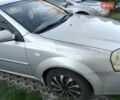 Серый Шевроле Лачетти, объемом двигателя 1.8 л и пробегом 390 тыс. км за 3300 $, фото 2 на Automoto.ua