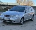 Сірий Шевроле Лачетті, об'ємом двигуна 1.8 л та пробігом 231 тис. км за 3900 $, фото 1 на Automoto.ua