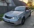 Сірий Шевроле Лачетті, об'ємом двигуна 1.8 л та пробігом 244 тис. км за 4490 $, фото 1 на Automoto.ua