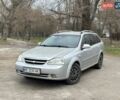 Серый Шевроле Лачетти, объемом двигателя 1.8 л и пробегом 217 тыс. км за 3250 $, фото 1 на Automoto.ua