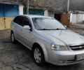 Серый Шевроле Лачетти, объемом двигателя 1.8 л и пробегом 357 тыс. км за 5200 $, фото 1 на Automoto.ua