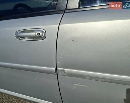 Серый Шевроле Лачетти, объемом двигателя 1.8 л и пробегом 212 тыс. км за 3500 $, фото 2 на Automoto.ua