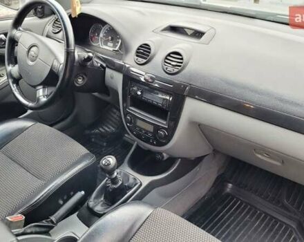 Серый Шевроле Лачетти, объемом двигателя 1.6 л и пробегом 244 тыс. км за 5500 $, фото 21 на Automoto.ua