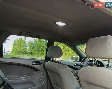 Серый Шевроле Лачетти, объемом двигателя 1.8 л и пробегом 265 тыс. км за 4750 $, фото 16 на Automoto.ua