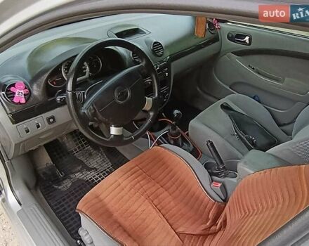 Сірий Шевроле Лачетті, об'ємом двигуна 1.8 л та пробігом 255 тис. км за 5400 $, фото 11 на Automoto.ua