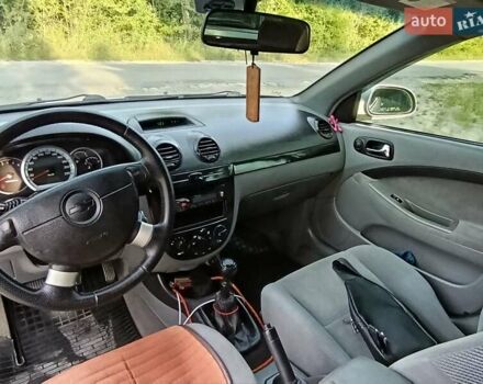 Сірий Шевроле Лачетті, об'ємом двигуна 1.8 л та пробігом 255 тис. км за 5400 $, фото 12 на Automoto.ua