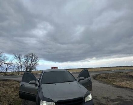 Серый Шевроле Лачетти, объемом двигателя 1.6 л и пробегом 265 тыс. км за 3100 $, фото 1 на Automoto.ua