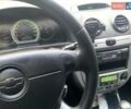 Синий Шевроле Лачетти, объемом двигателя 1.8 л и пробегом 152 тыс. км за 5500 $, фото 9 на Automoto.ua
