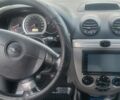 Синій Шевроле Лачетті, об'ємом двигуна 1.6 л та пробігом 254 тис. км за 3700 $, фото 5 на Automoto.ua