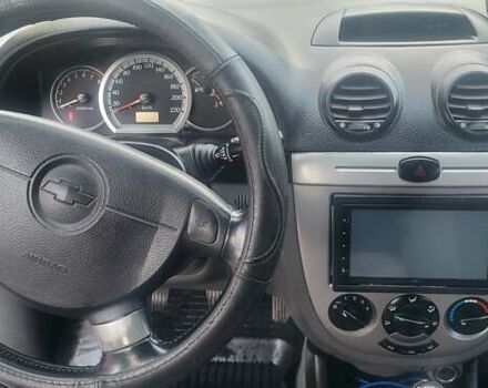 Синий Шевроле Лачетти, объемом двигателя 1.6 л и пробегом 254 тыс. км за 3700 $, фото 12 на Automoto.ua