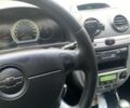 Синий Шевроле Лачетти, объемом двигателя 1.8 л и пробегом 152 тыс. км за 5500 $, фото 10 на Automoto.ua
