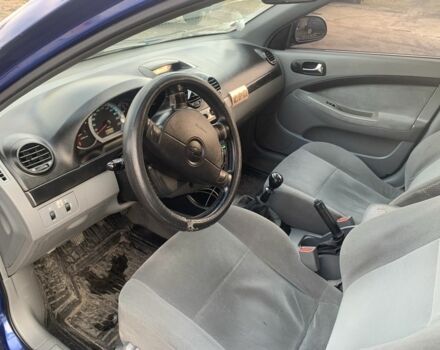 Синий Шевроле Лачетти, объемом двигателя 1.6 л и пробегом 261 тыс. км за 3500 $, фото 5 на Automoto.ua