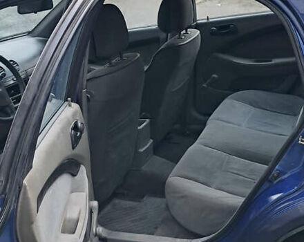 Синий Шевроле Лачетти, объемом двигателя 1.6 л и пробегом 350 тыс. км за 2300 $, фото 13 на Automoto.ua