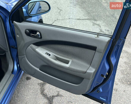 Синий Шевроле Лачетти, объемом двигателя 1.8 л и пробегом 188 тыс. км за 4999 $, фото 25 на Automoto.ua