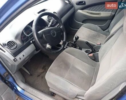 Синій Шевроле Лачетті, об'ємом двигуна 1.6 л та пробігом 357 тис. км за 3094 $, фото 7 на Automoto.ua