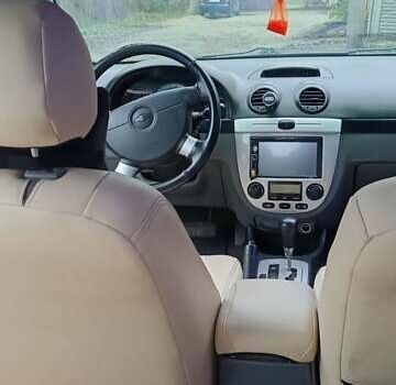 Синий Шевроле Лачетти, объемом двигателя 1.8 л и пробегом 242 тыс. км за 4300 $, фото 3 на Automoto.ua