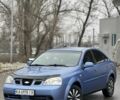 Синий Шевроле Лачетти, объемом двигателя 1.8 л и пробегом 258 тыс. км за 2600 $, фото 1 на Automoto.ua