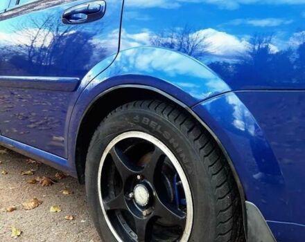 Синий Шевроле Лачетти, объемом двигателя 1.8 л и пробегом 233 тыс. км за 4499 $, фото 2 на Automoto.ua