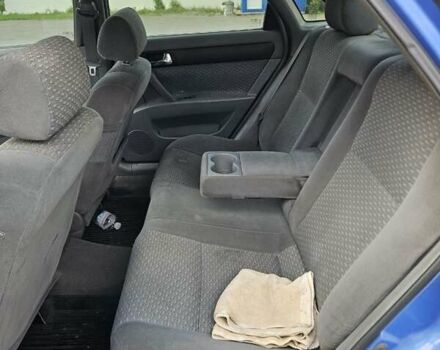 Синій Шевроле Лачетті, об'ємом двигуна 1.8 л та пробігом 250 тис. км за 2700 $, фото 7 на Automoto.ua