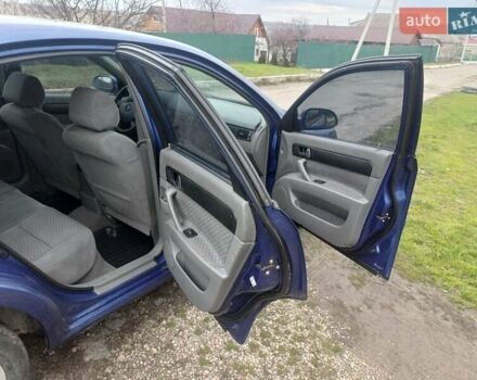 Синій Шевроле Лачетті, об'ємом двигуна 1.8 л та пробігом 186 тис. км за 3950 $, фото 14 на Automoto.ua