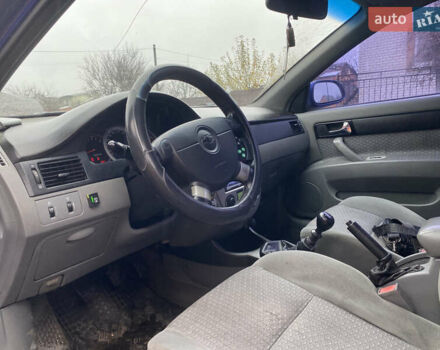 Синій Шевроле Лачетті, об'ємом двигуна 1.8 л та пробігом 200 тис. км за 3199 $, фото 7 на Automoto.ua