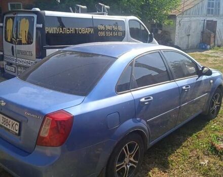 Синий Шевроле Лачетти, объемом двигателя 1.6 л и пробегом 300 тыс. км за 3300 $, фото 6 на Automoto.ua