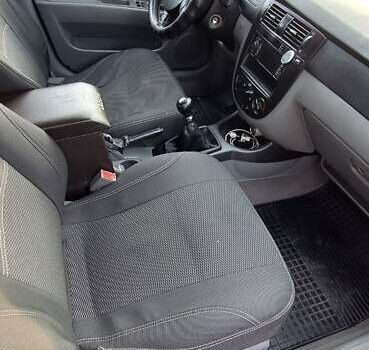 Синій Шевроле Лачетті, об'ємом двигуна 1.6 л та пробігом 225 тис. км за 4400 $, фото 11 на Automoto.ua