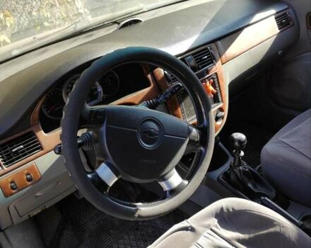 Синий Шевроле Лачетти, объемом двигателя 1.8 л и пробегом 148 тыс. км за 3000 $, фото 10 на Automoto.ua