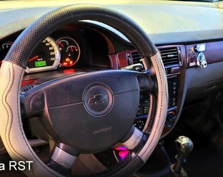 Синий Шевроле Лачетти, объемом двигателя 1.8 л и пробегом 382 тыс. км за 4000 $, фото 1 на Automoto.ua