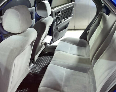 Синій Шевроле Лачетті, об'ємом двигуна 1.8 л та пробігом 251 тис. км за 4200 $, фото 19 на Automoto.ua