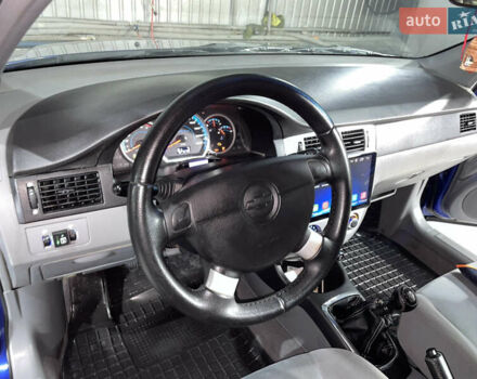Синій Шевроле Лачетті, об'ємом двигуна 1.8 л та пробігом 251 тис. км за 4200 $, фото 22 на Automoto.ua