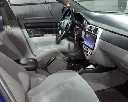 Синій Шевроле Лачетті, об'ємом двигуна 1.8 л та пробігом 251 тис. км за 4200 $, фото 12 на Automoto.ua