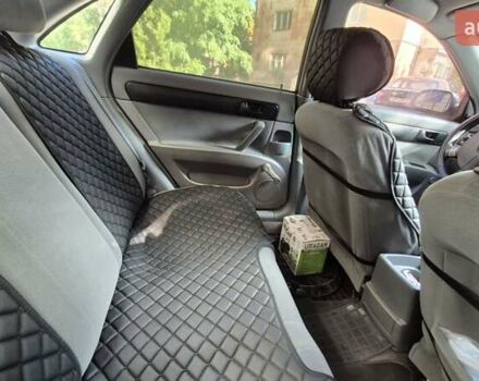 Синий Шевроле Лачетти, объемом двигателя 1.6 л и пробегом 243 тыс. км за 3800 $, фото 14 на Automoto.ua