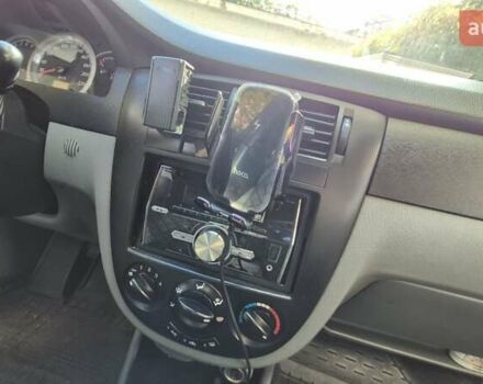 Синий Шевроле Лачетти, объемом двигателя 1.6 л и пробегом 243 тыс. км за 3800 $, фото 13 на Automoto.ua