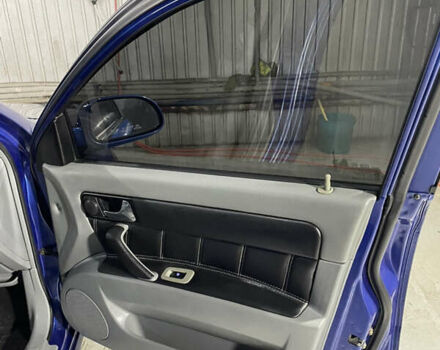 Синій Шевроле Лачетті, об'ємом двигуна 1.8 л та пробігом 251 тис. км за 4200 $, фото 11 на Automoto.ua