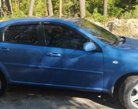 Синий Шевроле Лачетти, объемом двигателя 1.8 л и пробегом 220 тыс. км за 4000 $, фото 2 на Automoto.ua